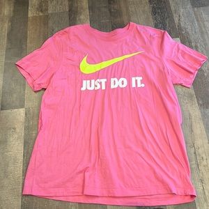 Pink T-shirt with yellowish green logo